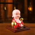 Solar Power Moving Head Buddha Statue Car Ornament (1 Pc / Mix Color)